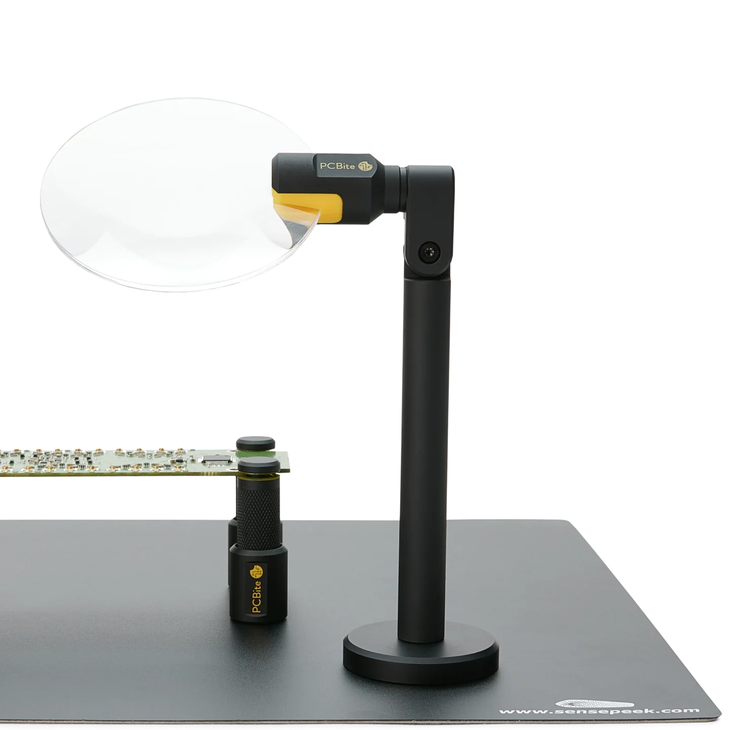 Magnifier with magnetic base stands secure on baseplate overlooking PCB held by PCB holders (PCBITE-4020)