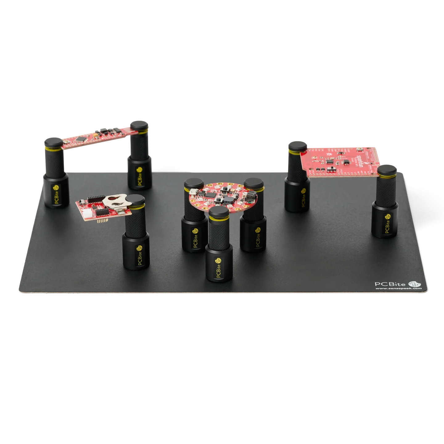 Eight magnetic spring-loaded PCB holders securing various sized boards on XL insulated baseplate (PCBITE-4021)