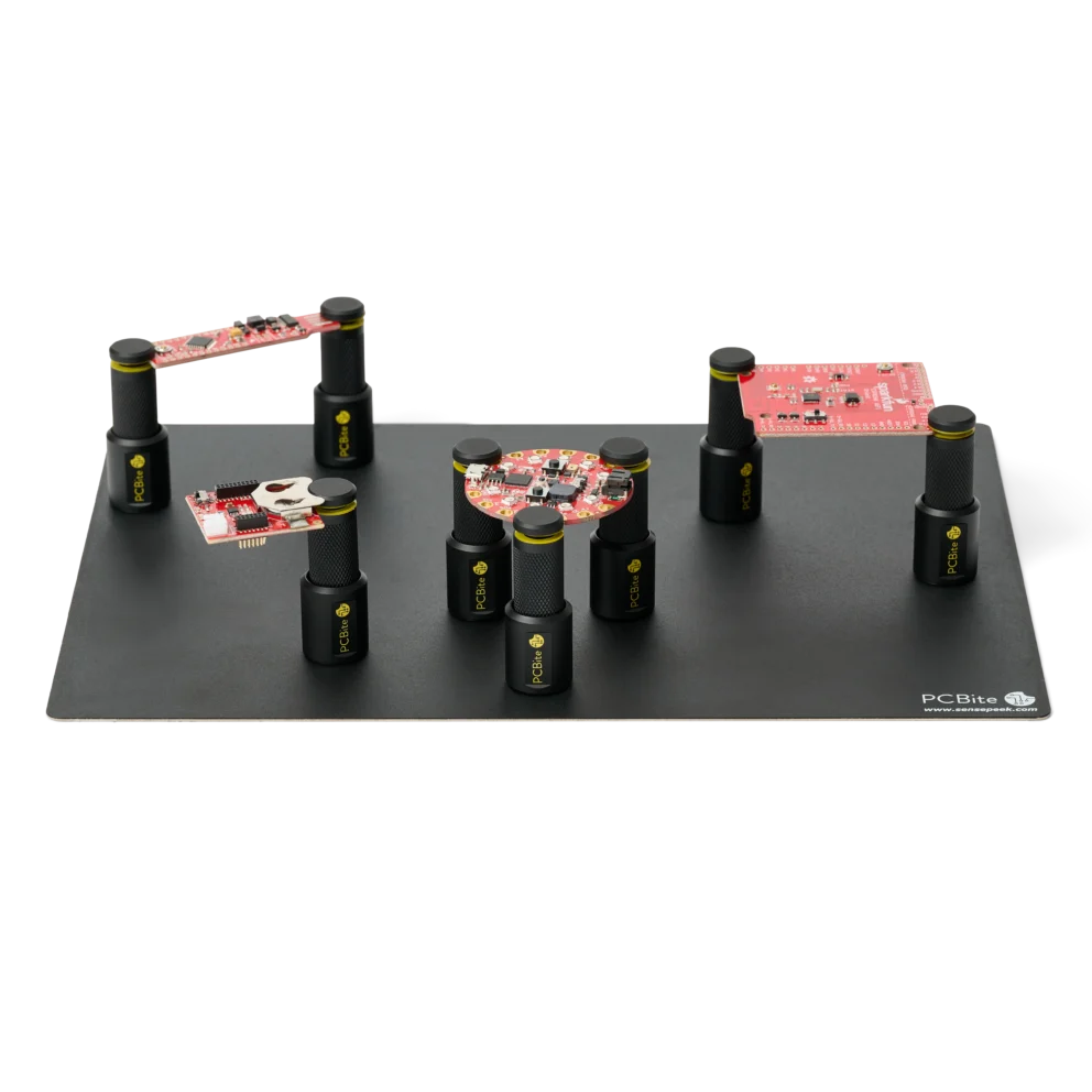 Eight magnetic spring-loaded PCB holders securing various sized boards on XL insulated baseplate (PCBITE-4022)