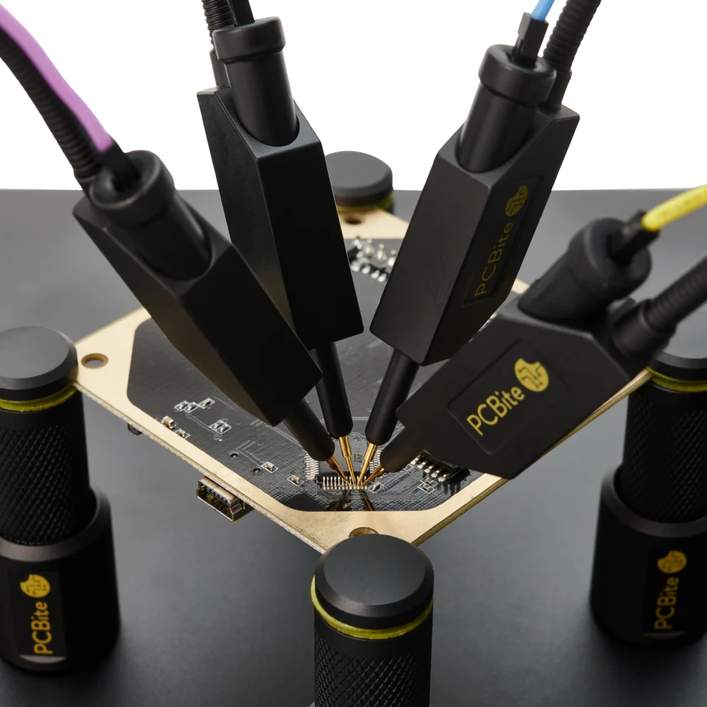 Four handsfree SQ10 probes with spring-loaded tips probing PCB signals simultaneously (PCBITE-6005)