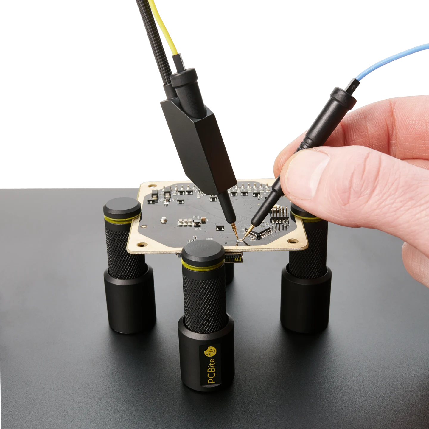 Two SQ10 probes one used handsfree and the other handheld to measure the PCB under test (PCBITE-6005)