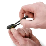 Hand showing how to mount the SQ10 probe in the SQ probe holder for handsfree measurements (PCBITE-6011)