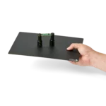 SQ200 200 MHz, Hand handing over a setup with two spring-loaded PCB holders on a large insulated baseplate (PCBITE-6016)