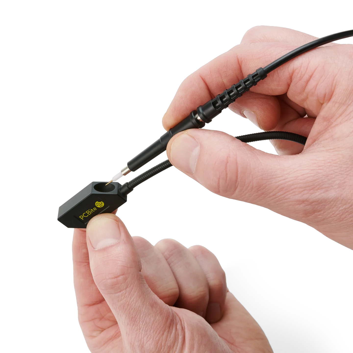 Hand showing how to mount SQ500 500MHz oscilloscope probe in the SQ probe holder for handsfree measurements (PCBITE-6024)