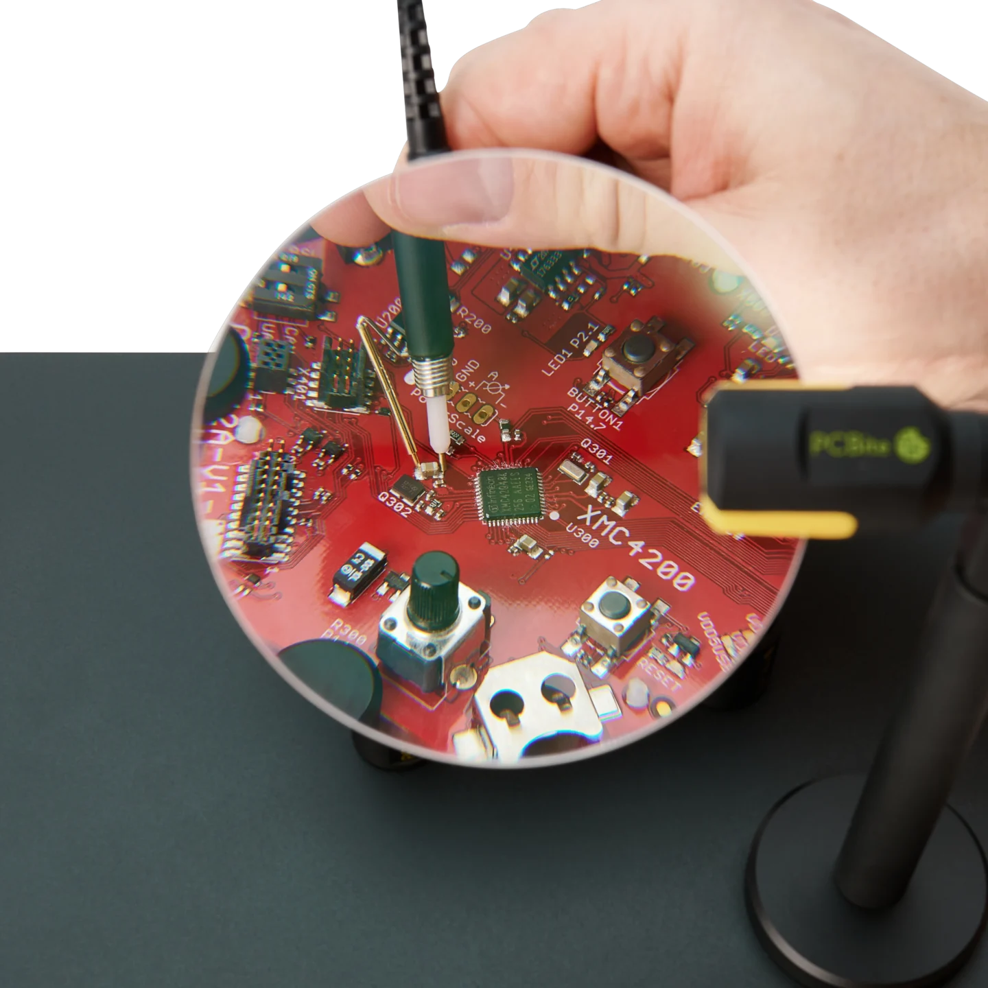 Measuring handheld on SMD component using SQ500 500 MHz oscilloscope probe with the ground spring needle (PCBITE-6029)