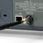 BNC adapter connected to instrument with inserted probe for extended testing capability (PCBITE-7003)