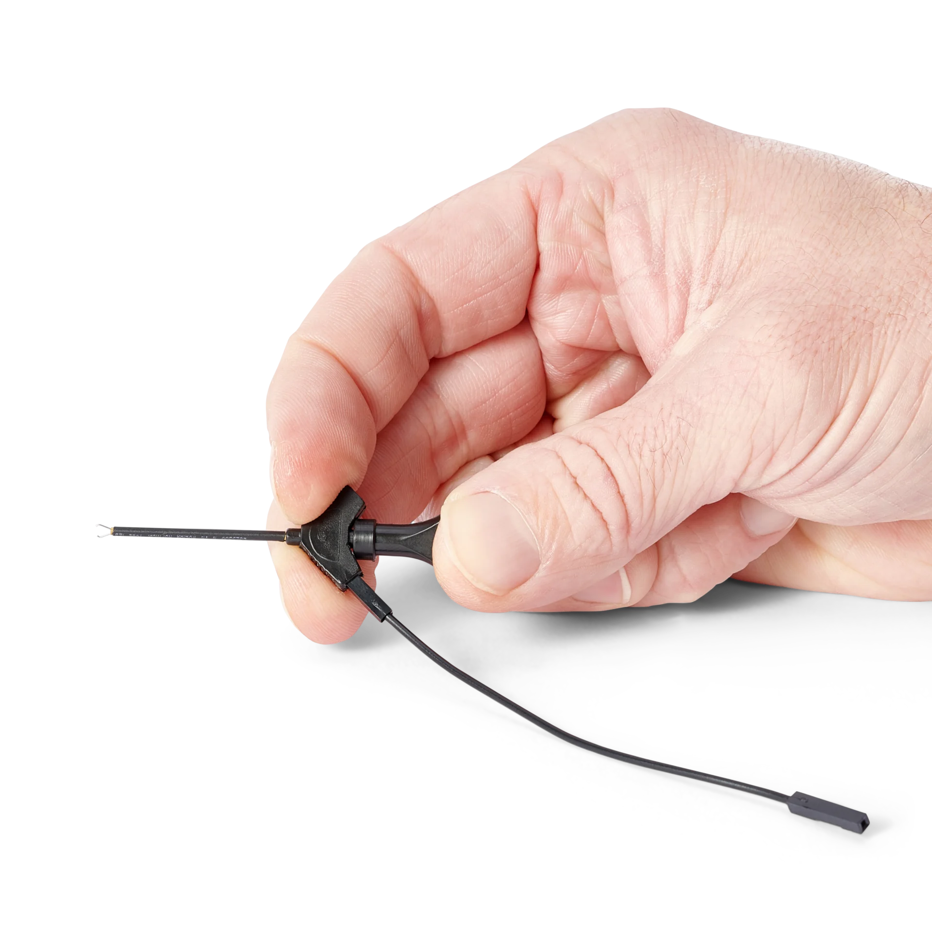 Hand showing the airplane test hook with attached 10cm dupont cable (PCBITE-7004)