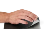 Hand applying the A5 sized insulation cover on the small baseplate (PCBITE-7019)