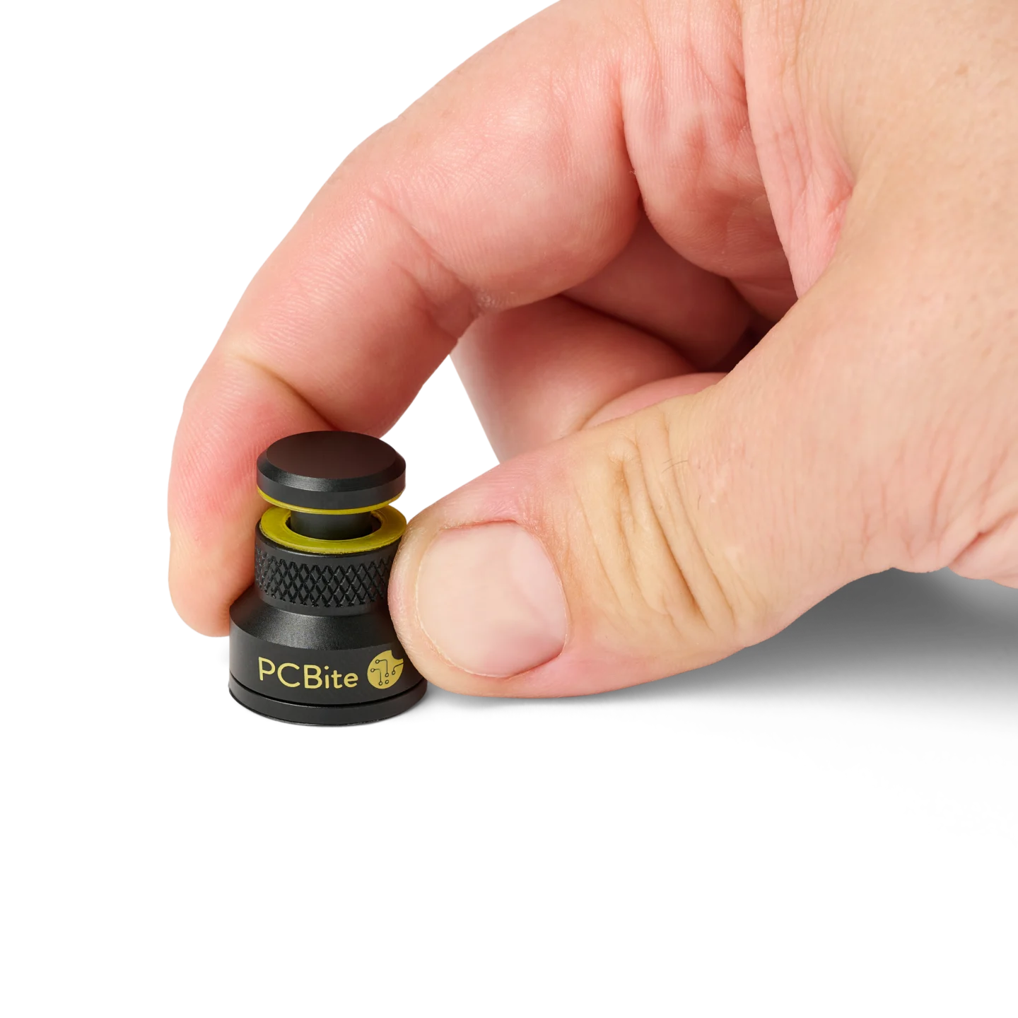 Hand showing how to open a low profile PCB holders, pushing down against the table (PCBITE-7023)