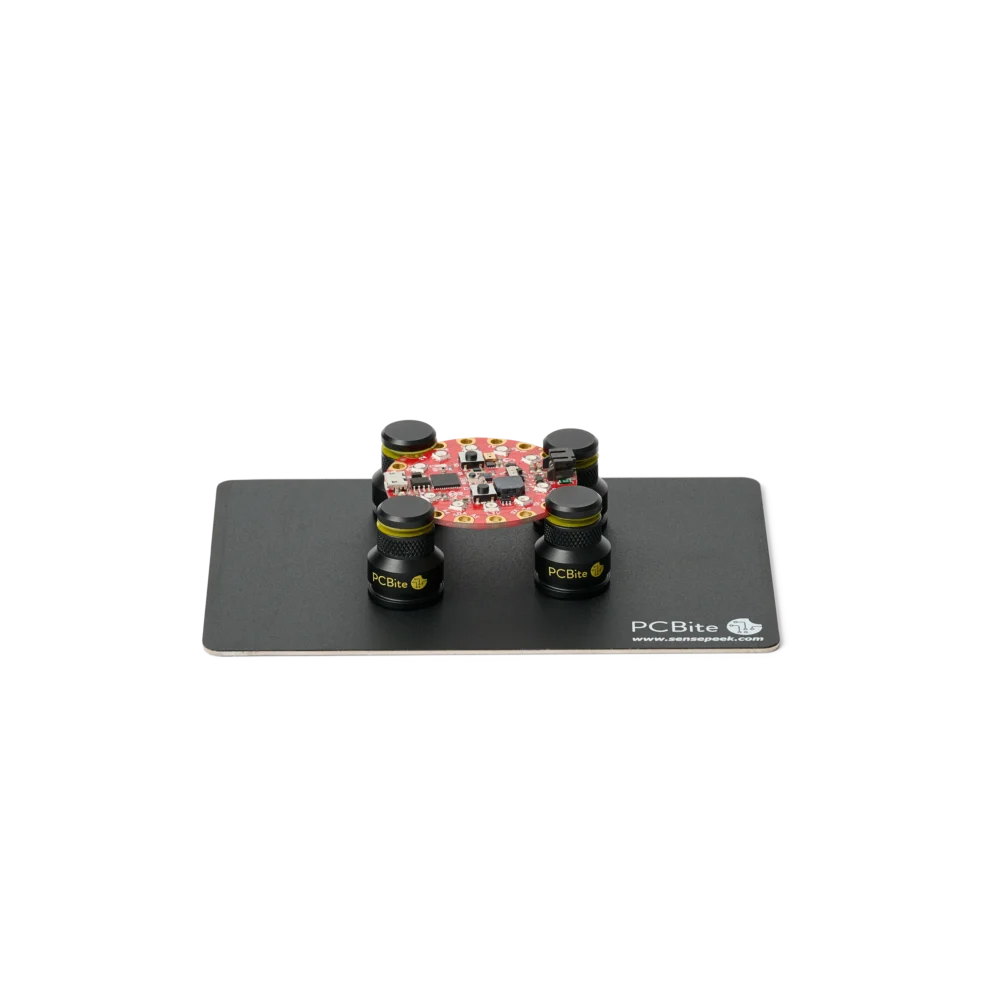 Four low profile PCB holders on extra small insulated baseplate holding a PCB (PCBITE-7024)