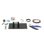 Complete soldering setup with PCB held by two PCB holders on small insulated baseplate (PCBITE-7025)
