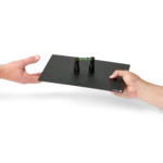SP10, Hand receiving a setup with two spring-loaded PCB holders on a large insulated baseplate (PCBITE-7028)