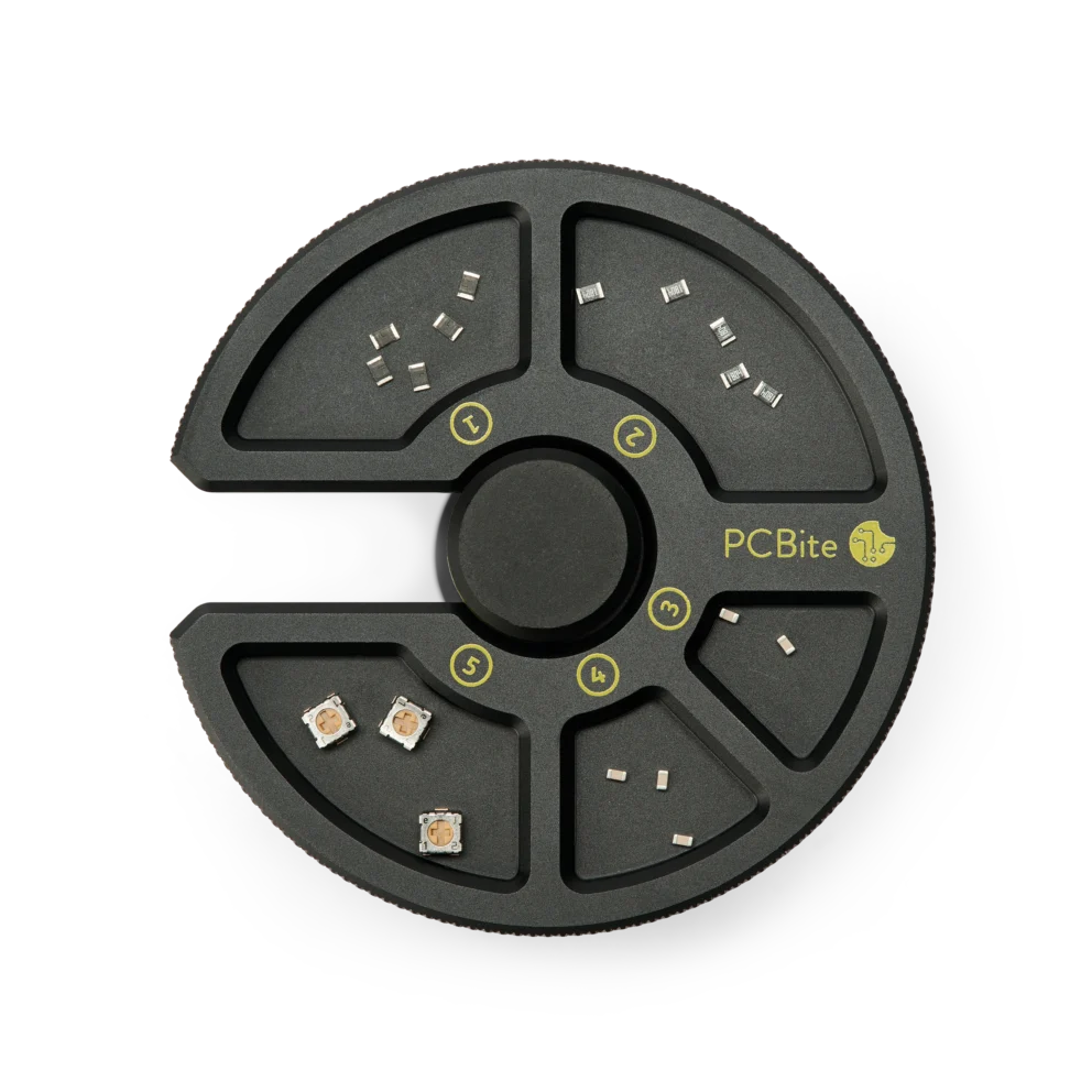 Component tray numbered compartments filled with different SMD components (PCBITE-7029)