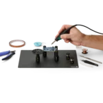 Hand soldering setup with component tray, wire stands and PCB holders on insulated baseplate (PCBITE-7030)