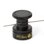 Solder threaded through lock hole of magnetic solder wire holder (PCBITE-7030)