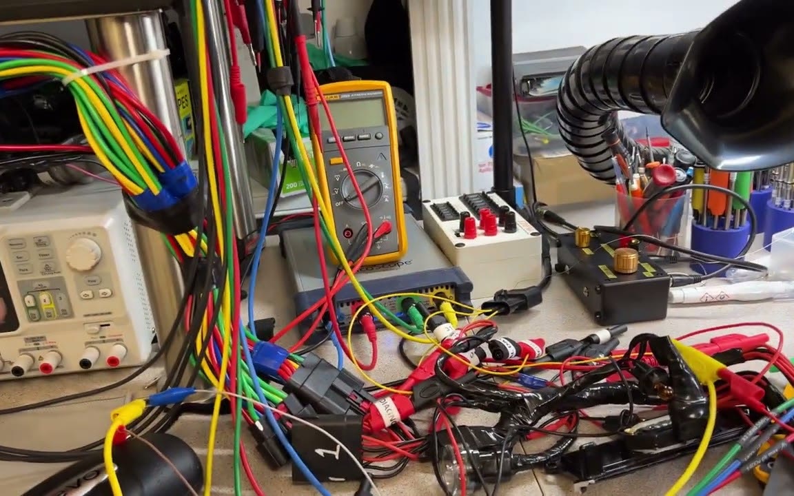 Maic Salazar's bench for diagnosing automotive control modules.