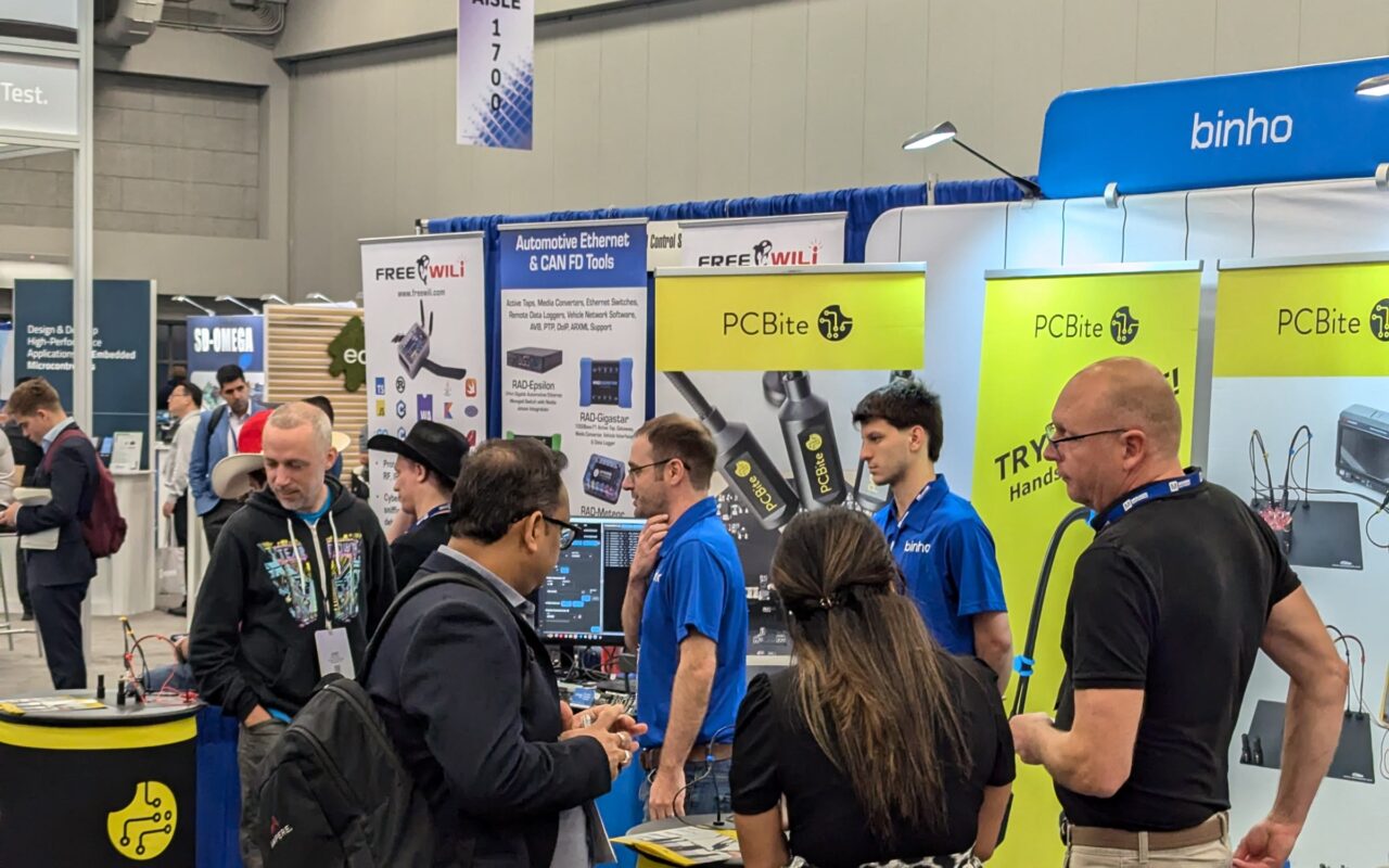 Visitors at the Sensepeek booth at Embedded World North America 2024 in Austin.