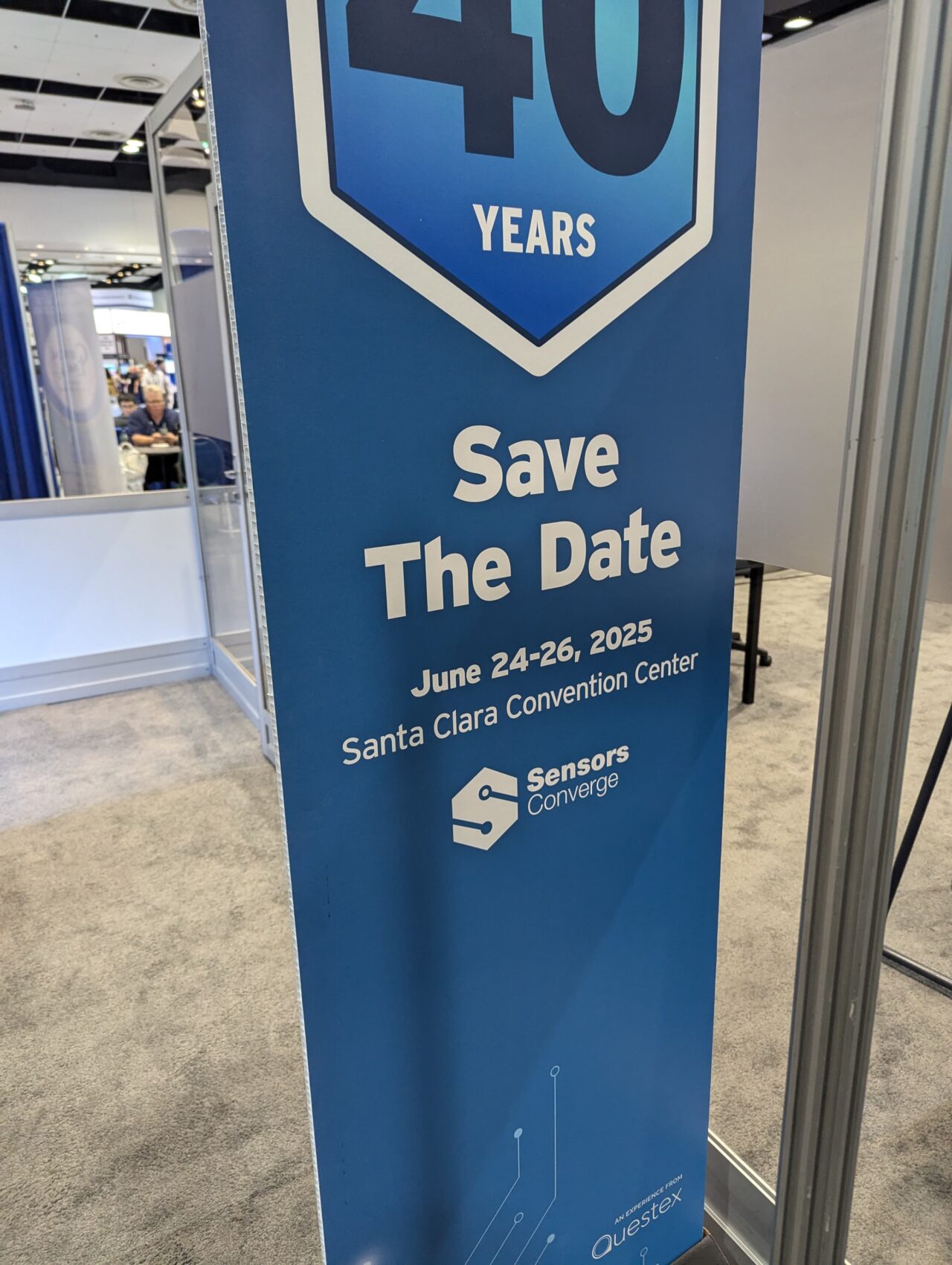 The Save the Date sign for Sensors Converge 2025, 24-26 June 2025 at the Santa Clara Convention Center.