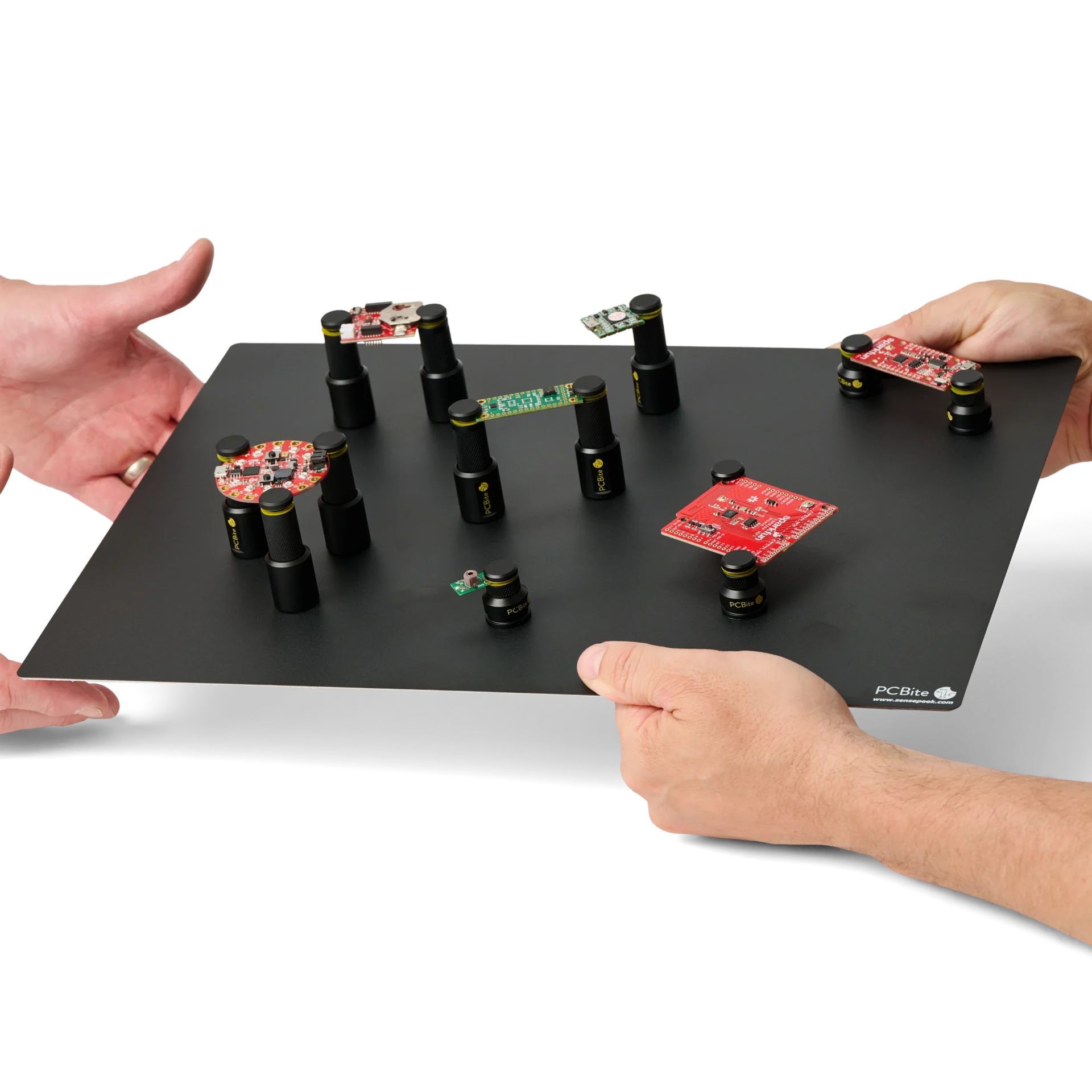 Thirteen mixed low profile and standard height PCB holders securing various boards on XL baseplate (PCBITE-4021)